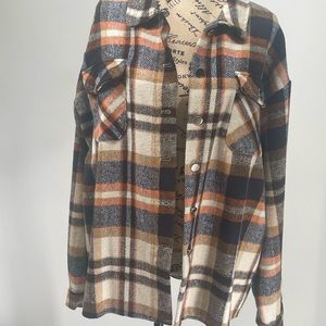 This plaid Shacket from Cezele is exactly what your Fall wardrobe needs!